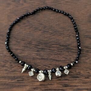 Thin Black Stretch Bracelet with Gold Tone Charms